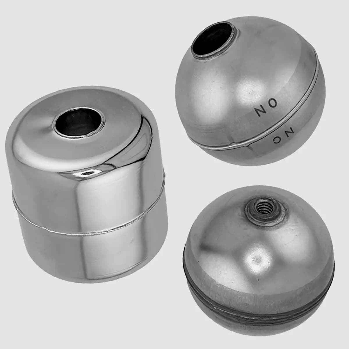 Collection of stainless steel industrial floats for liquid level control applications